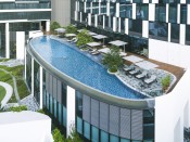 a swimming pool of mercure hotel in singapore